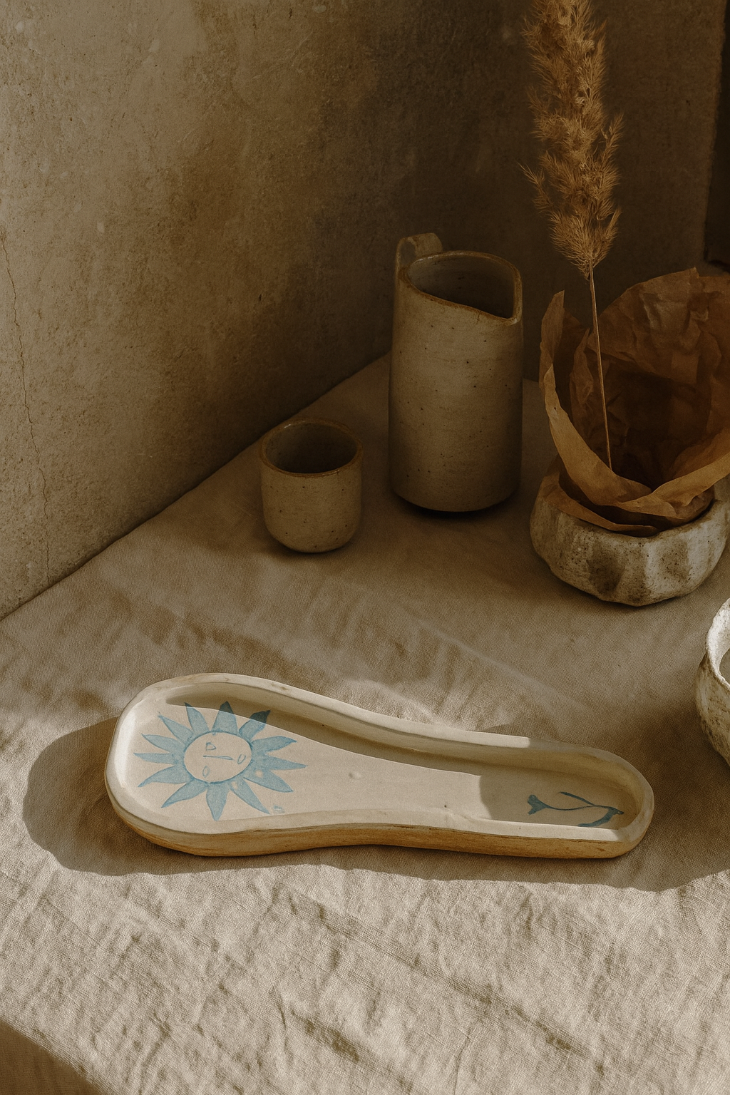 Repose-cuillère blanc et bleu